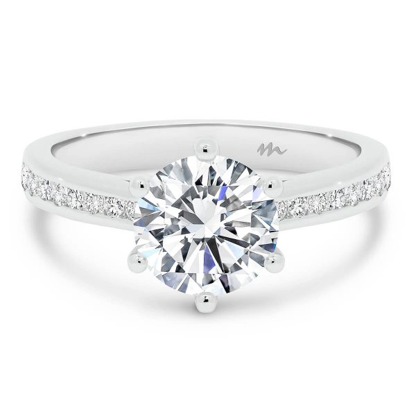 Andie Round Moissanite 6-prong engagement ring with channel set moissanite band