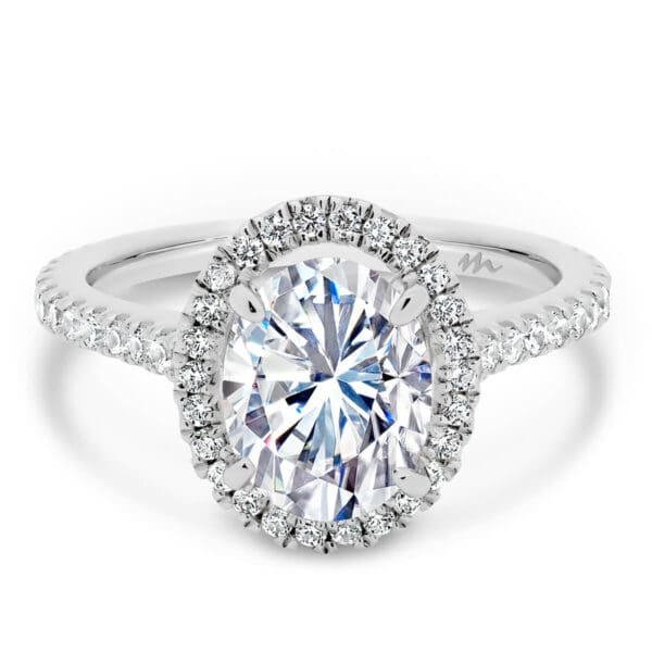 Ava Oval 8x6-9x7 Moissanite halo engagement ring on 3/4 accented band