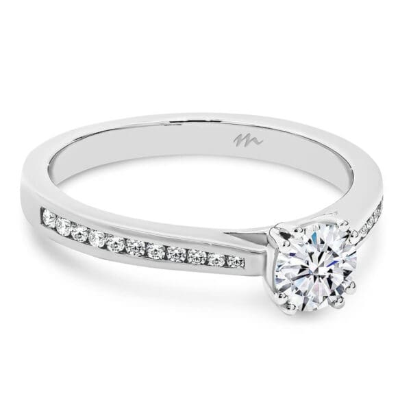 Bailey 5.0 Moissanite Engagement Ring With Double 4 Prong Setting On Graduating Channel Set Half Band