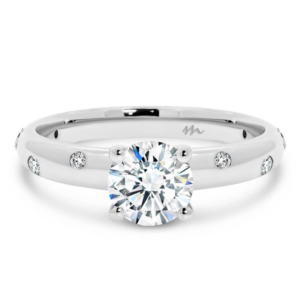 Cecilia 4 Prong Round Brilliant Moissanite ring with a random hammer set band