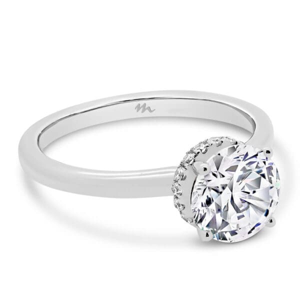 Davine 7.5-8.0 Moissanite ring with hidden halo on plain band