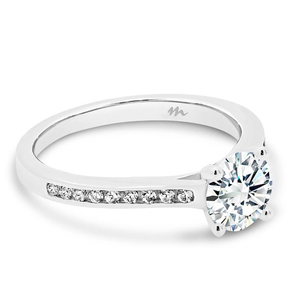 London 4 claw round moissanite ring with channel set band