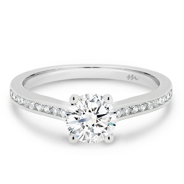 London 6.5-7.0 4 claw round Moissanite ring with channel set band