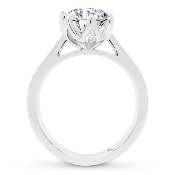 floral ring with encrusted pave-set band tapering in to centre stone