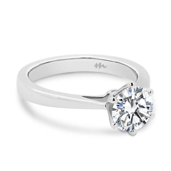 Taylor 6.5-7.0 round brilliant Moissanite engagement ring on flat tapered band