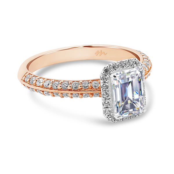 Arianne Emerald delicate halo ring on pave-set knife-edge band in two tone gold