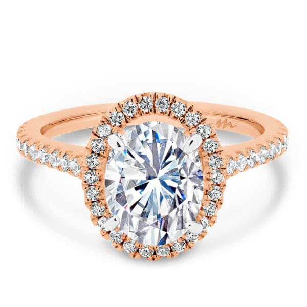 Ava Oval 8x6-9x7 Moissanite halo engagement ring on 3/4 accented band