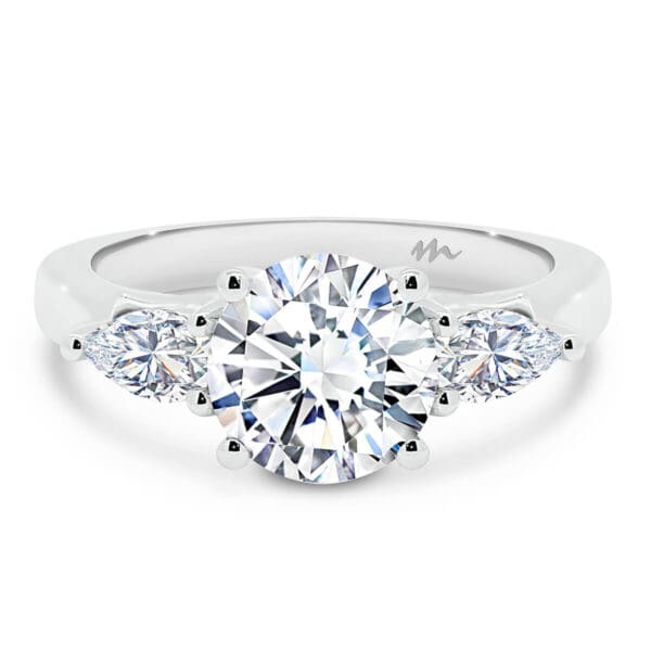 Tara Round trilogy ring with Pear cut side stones