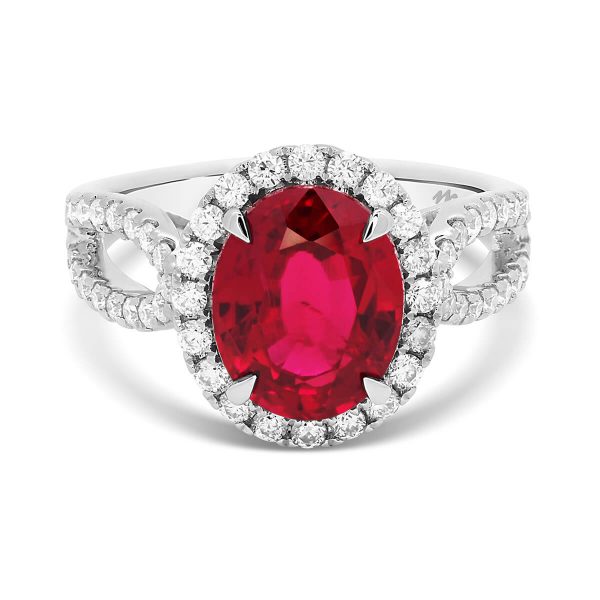 Ivy Red Ruby oval halo ring on filigree basket and split 3/4 shank