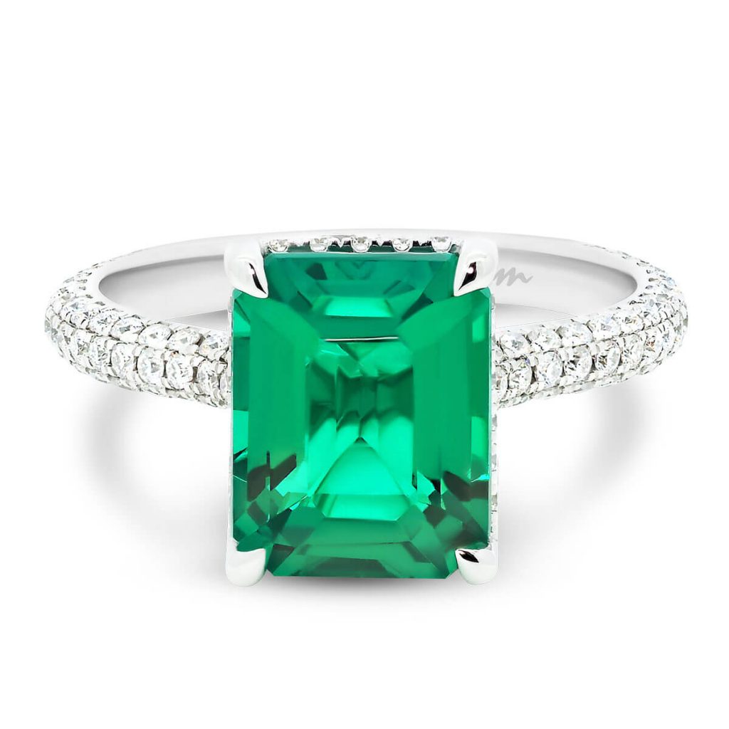 Kalina emerald gemstone ring in stone-set 4 prong on rolling 3-row micro pave band