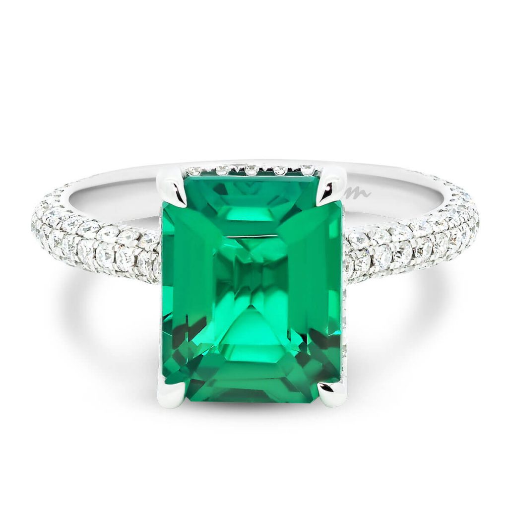 Kalina emerald gemstone ring in stone-set 4 prong on rolling 3-row micro pave band