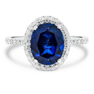 Violet Oval Sapphire Halo Ring With Rolling-Edge Halo And Stone-Set Bridge On Prong Set Half Band