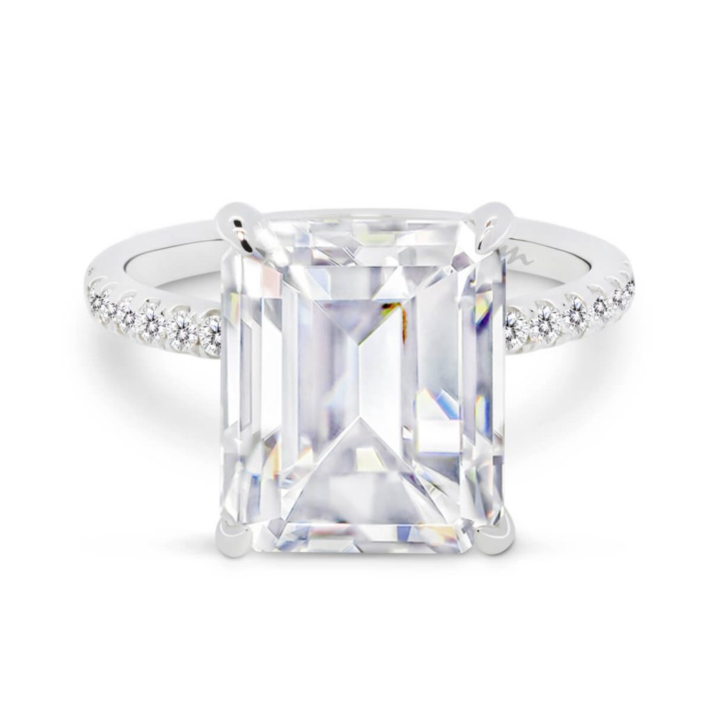 Estella large emerald cut on dlicate prong set half band with micro-pave under-rail