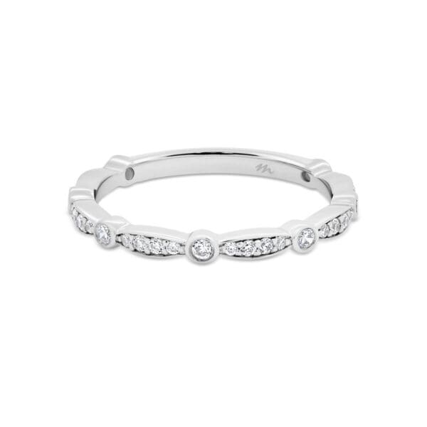 Madison Moissanite band in soft scallop shape with round bezel accent