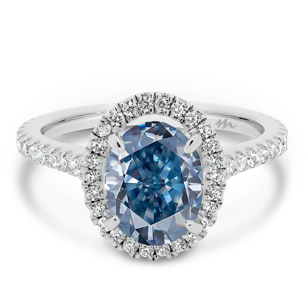 Ava Oval Blue Moissanite halo ring on 3/4 delicate prong set band