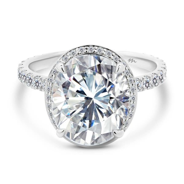 Capri 5.93ct oval halo ring with and detailed pave gallery on a refined prong band