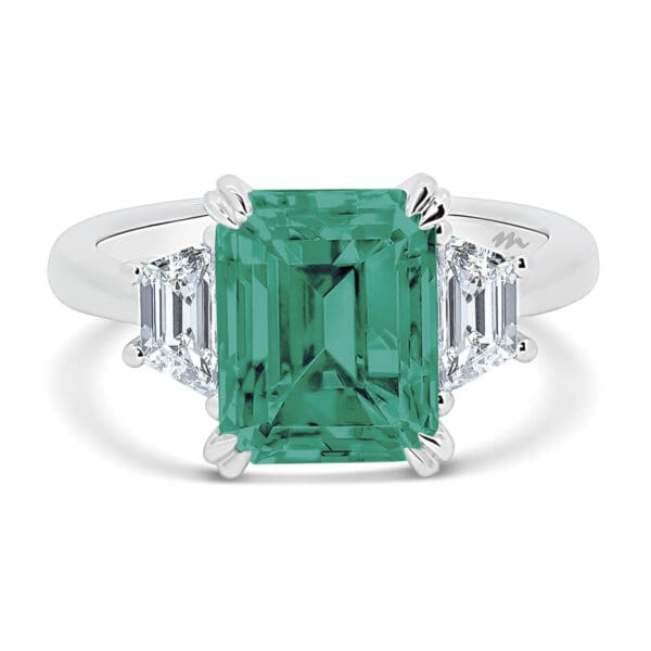 Aubrey Emerald 9X7 Green Trilogy With Trapezoid Stones On A Plain Band