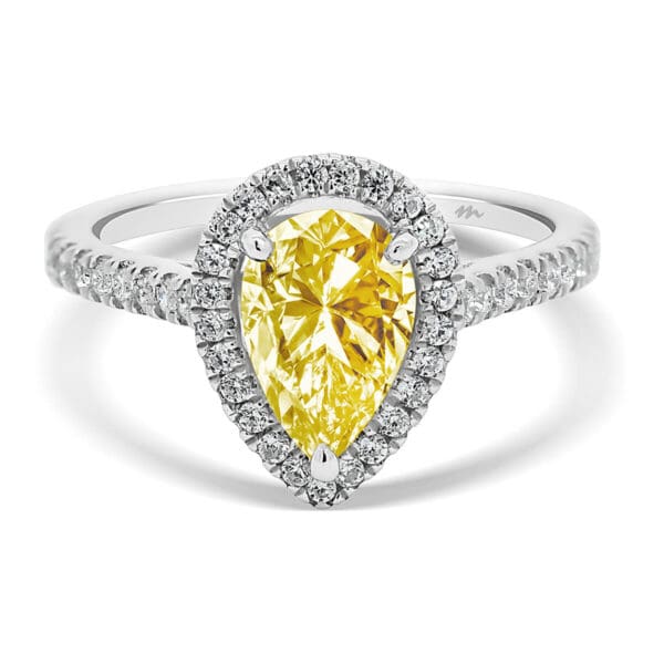 Ava Pear 9x6 Yellow Moissanite halo ring on 3/4 set band