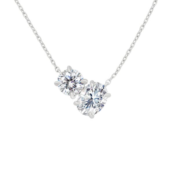 Madeleine Grande round cut and oval cut Moissanite Toi Et Moi necklace