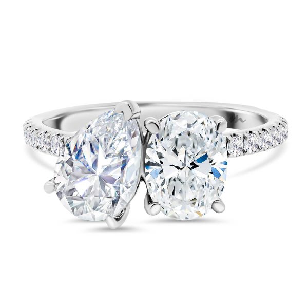 Nicolette 9x6-10x7 oval and pear accented Moissanite Toi Et Moi ring