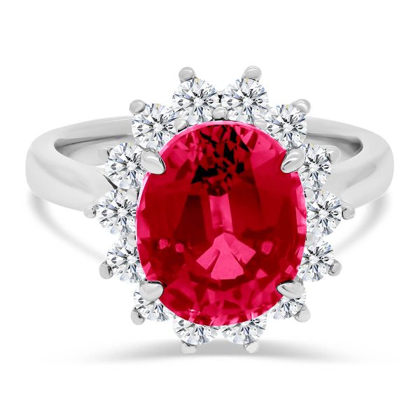 Diana 11x9 halo ring with ruby centre stone on a plain band