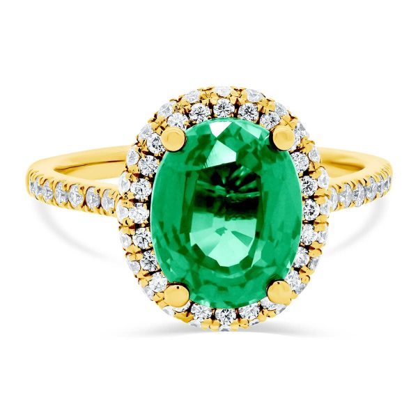 Vivienne oval emerald halo ring with rolling-edge halo and accented  bridge and band