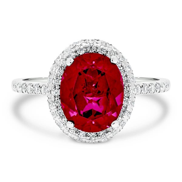 Vivienne oval ruby halo ring with rolling-edge halo and accented  bridge and band
