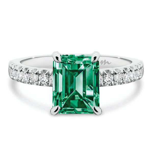 Janet Emerald 9x7 Green ring with 4-prong basket on micro pave band