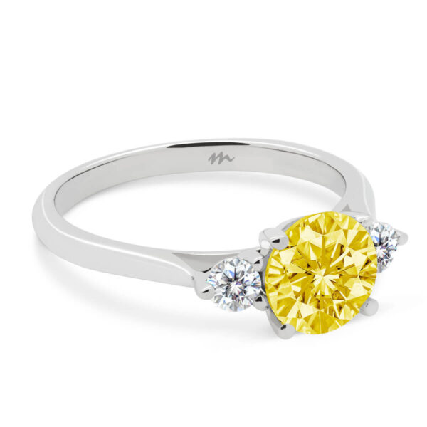 Lawnton 7.5 Yellow 4 prong trilogy ring on a fine knife-edge band