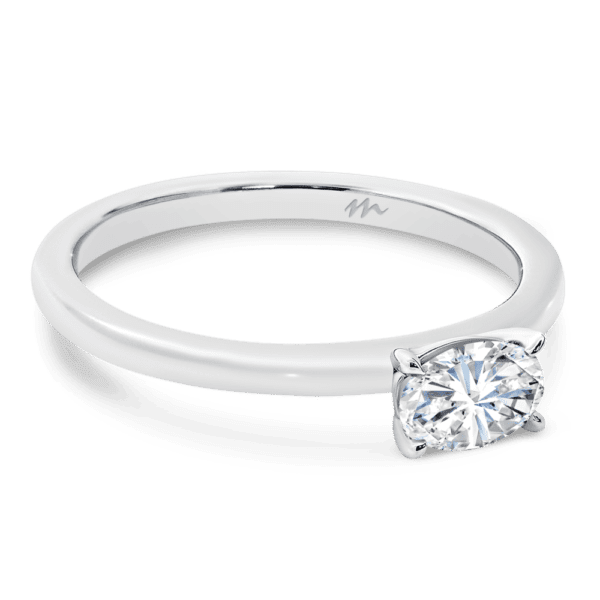 Jolie Oval 6X4 Angled White Gold Moissanite 4 Prong East West Set Solitaire Half Rounded Band Ring