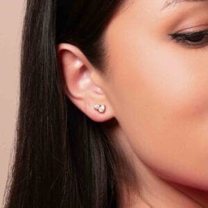 Model Wears Adeline Petite 3.0 Yellow Gold Diamond Round Pear Cut Prong Set Toi Et Moi Earrings
