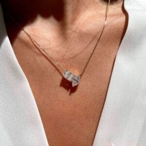 Model Wears Cosette 10X5 White Gold Moissanite Radiant Marquise Cut Prong Set Toi Et Moi Necklace
