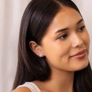 Model Wears Yarra 4.0 7.5 White Yellow Gold Lab Grown Diamond 4 Prong Classic Stud Earrings