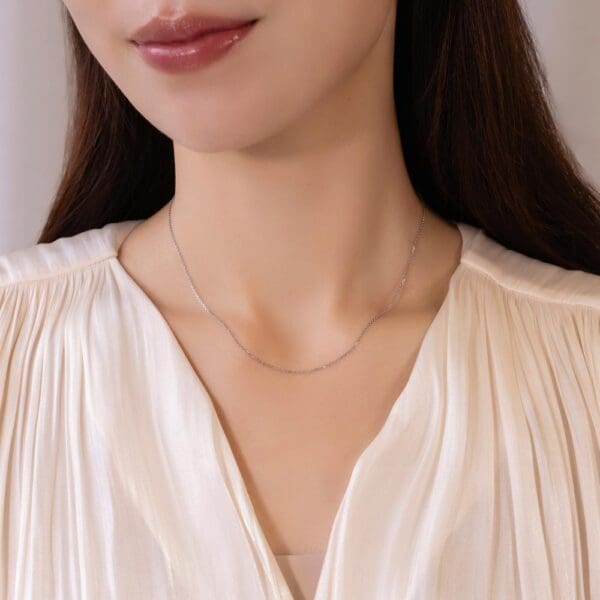 Model Wears 18K White Gold Adjustable Light Chain Front
