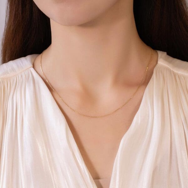Model Wears 18K Yellow Gold Adjustable Light Chain Front