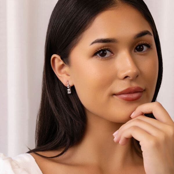 Model Wears Leona White Gold Diamond Double Emerald Cut Drop Earrings