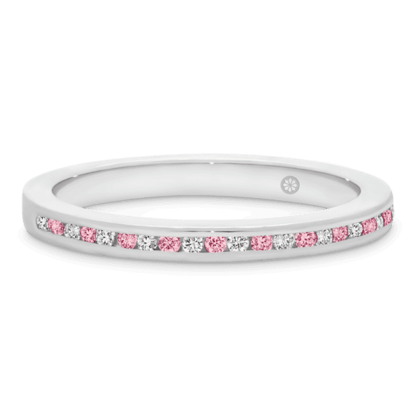 Model wears Carmen 1.5 white gold channel set wedding band Angelica 1.5 alternating pink Diamond U prong set ring