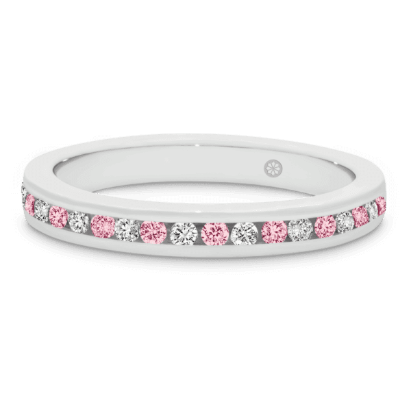 Model wears Carmen 2.0 white gold alternating pink Diamond channel set wedding band Gracie 2.5 scalloped round shared prong ring