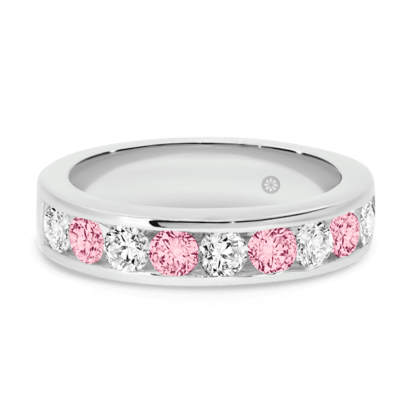 Model wears Carmen 2.0 white gold alternating pink Lab Grown Diamond channel set wedding ring