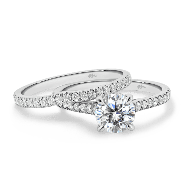 Erin A White Gold Moissanite Slightly Curved Wedding Band Erin Round Under Rail Prong Set Band Ring