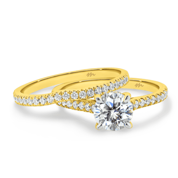 Erin A Yellow Gold Moissanite Slightly Curved Wedding Band Erin Round Under Rail Prong Set Band Ring