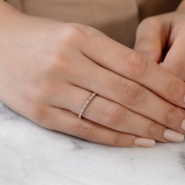 Model Wears Angela 1.5 Rose Gold Alternating Pink White Lab Grown Diamond U Prong Half Set Wedding Ring
