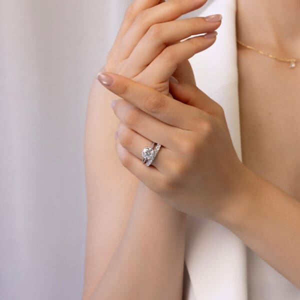 Model Wears Angela 3.0 White Gold Diamond U Prong Half Set Wedding Band Monica Cushion 9.0 Double Prong Solitaire Ring