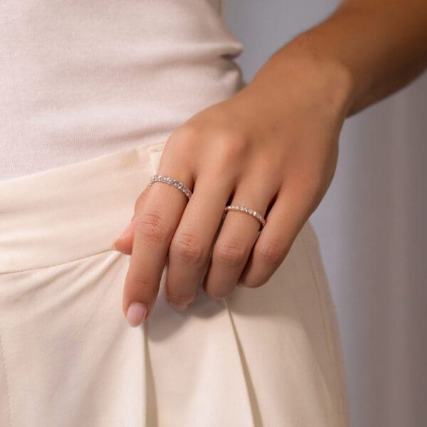 Model Wears Angelica 2.5 2.0 Alternating Pink White Diamond U Prong Set Rose Gold Wedding Ring