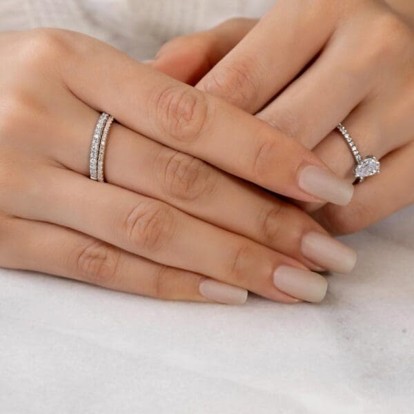 Model Wears Aspley A White Gold Diamond Straight Prong Set Wedding Band Angela 1.3 Rose Gold U Prong Half Set Ring