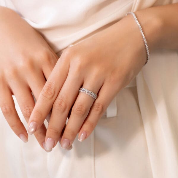 Model Wears Carmen 1.5 White Gold Channel Set Wedding Band Angelica 1.5 Alternating Pink Diamond U Prong Set Ring