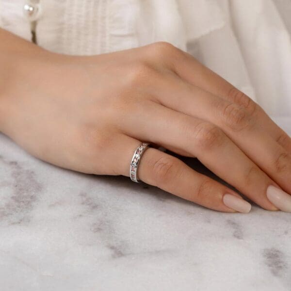 Model Wears Carmen 2.0 White Gold Alternating Pink Lab Grown Diamond Channel Set Wedding Ring