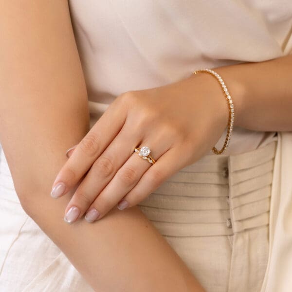 Model Wears Emma White Gold Diamond Marquise Round Subtle Curve Wedding Band Milton 7.0 Moissanite Prong Crossover Ring