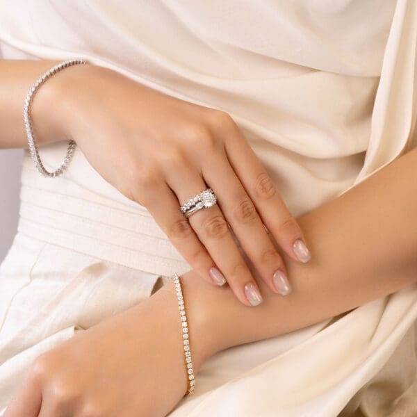 Model Wears Gigi White Gold Diamond Alternating Round Cluster Wedding Band Katherine 8.0 Moissanite Double Prong Trilogy Ring
