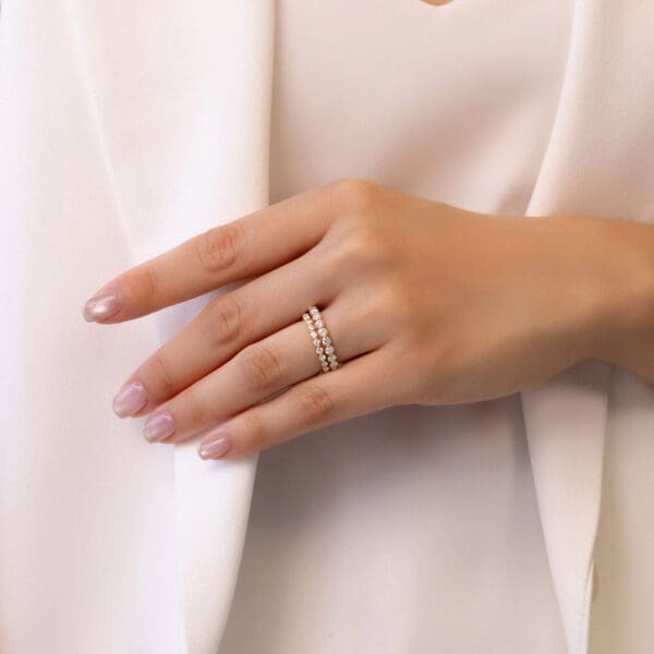 Model Wears Gracie 2.0 2.5 Yellow Gold Diamond Scalloped Round Shared Prong Wedding Ring